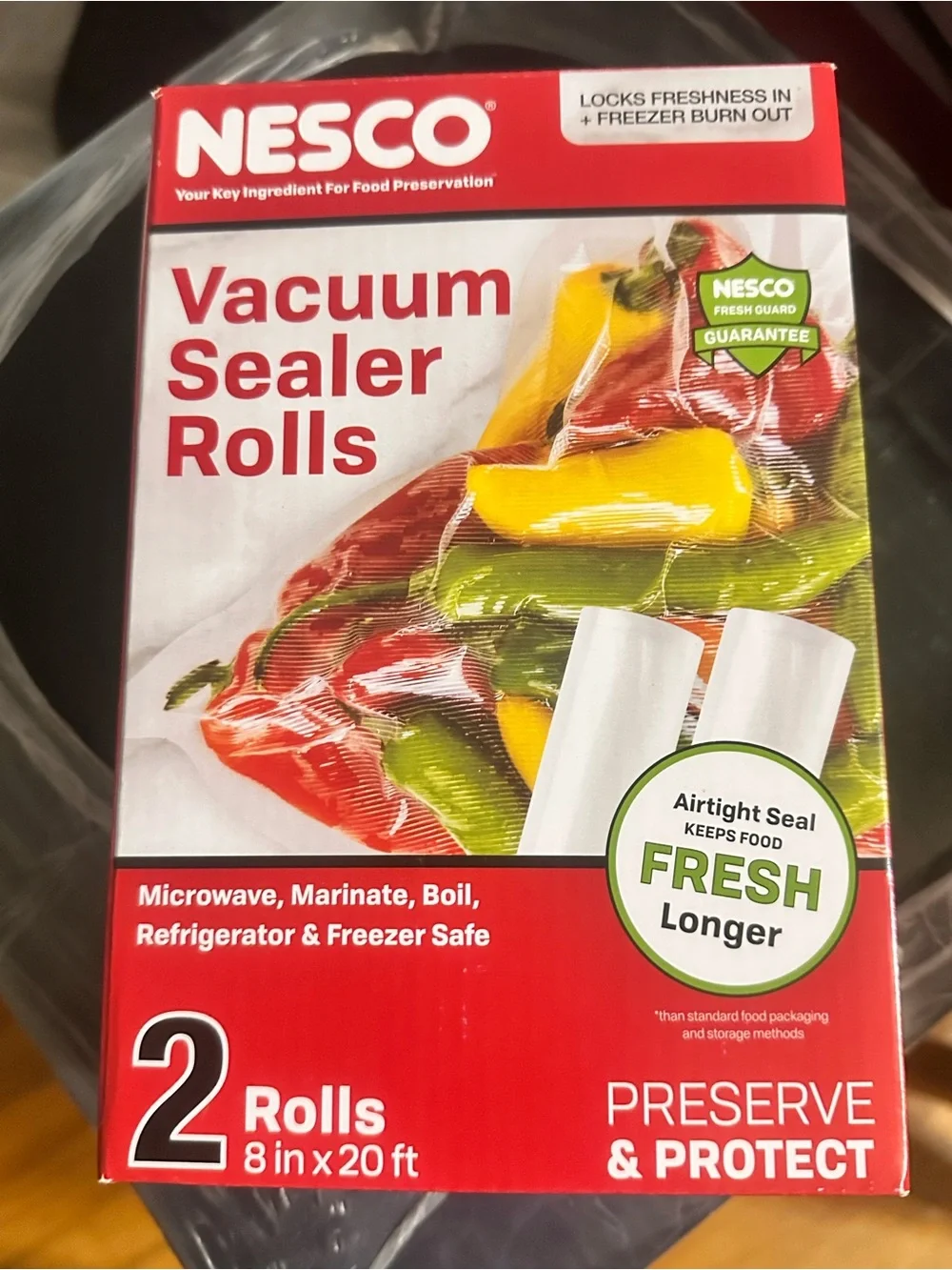Nesco Deluxe Vacuum Sealer and two extra rolls of seal